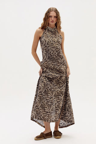 Woman wearing a floral dress on a white background